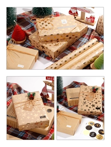 Detail of Christmas waterproof kraft paper with gold foil stars and festive stickers set