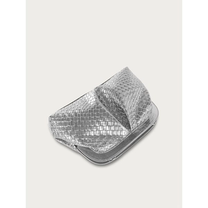 Detailed view of silver woven texture and metallic sheen on the pleated dumpling bag