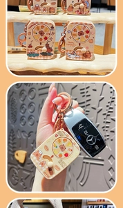 Close-up of cute Capybara spinning toy keychain with a rose gold metal hook