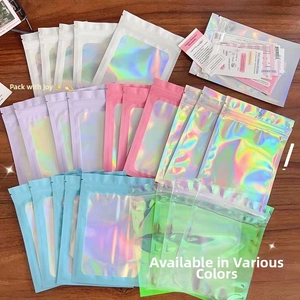 Macro detail of colorful holographic resealable bags with transparent front and zip lock