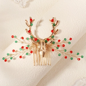 Christmas reindeer hair comb with red and green crystals on a gold alloy base