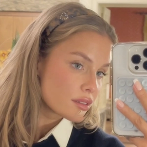 French tortoise shell acetate headband with heart design worn by a blonde woman