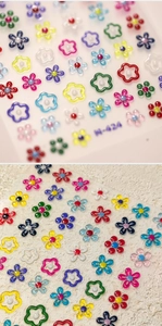 Detailed 3D colorful resin flower nail art stickers with pearls model M-424 on stone texture