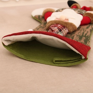 Detail of Christmas stocking opening showing spacious capacity and plush linen fabric