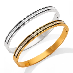Classic stainless steel bangle set with black enamel stripes and shimmering rhinestones