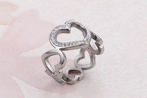 Detailed macro view of hollow heart ring with shimmering pavé set clear crystals