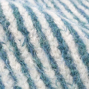 Winter striped knit beanie in cream and teal with soft mohair textured fiber detail