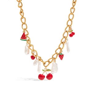 Detail of 18K gold chain necklace with strawberry, watermelon charms and white pearls