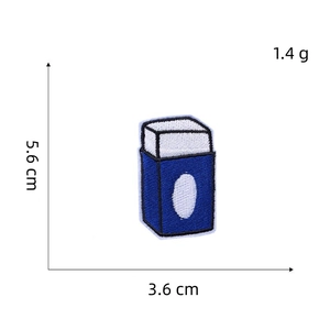 Detailed size view of blue eraser embroidery patch measuring 5.6 cm by 3.6 cm