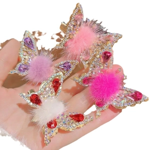 Cute moving butterfly hair clips for girls with sparkling rhinestones and plush pom poms