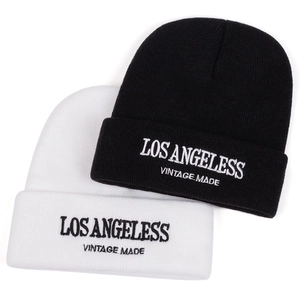 Winter knitted beanie hats with Los Angeles embroidery in black and white colors