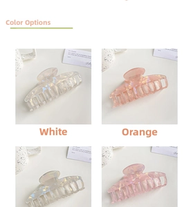 Detail view of large iridescent marble pattern hair claw clips in various colors