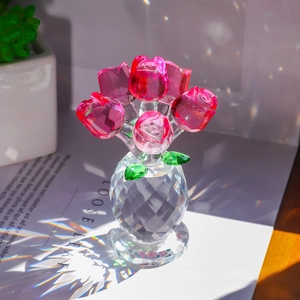 Pink crystal rose bouquet in a faceted vase with rainbow light reflections for home decor