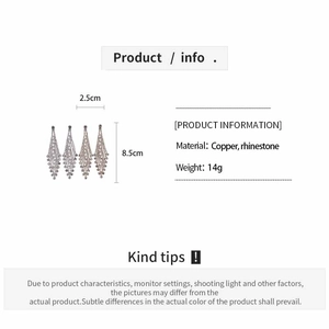 Detailed size specifications of silver diamond tassel earrings with height and weight
