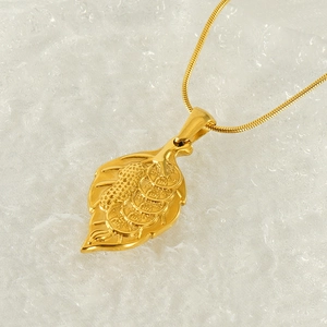Detail of leaf-shaped gold titanium steel necklace with gourd and coin relief motifs