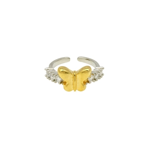 Detail of two-tone adjustable ring with golden butterfly and sparkling cubic zirconia