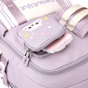 Lavender school backpack for girls with cute cat front pocket and rainbow stationery detail