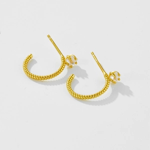 Elegant gold twisted rope C-shaped stud earrings featuring a sparkling white zircon