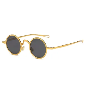 Retro Steampunk Sonnenbrille mit rundem goldenem Metallrahmen und dunklen Gläsern