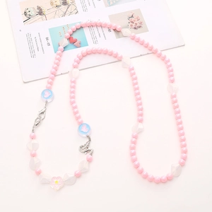 Acrylic beaded crossbody phone strap with pink pearls, transparent beads and flower pendant