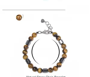 Detail of 8mm tiger eye beads with hematite spacers and adjustable lobster clasp chain
