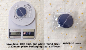 Detailed view of 2m blue and white paper garland on scale and in packaging