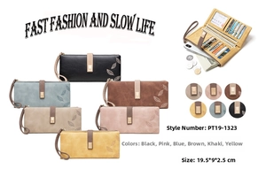 Detailed view of women long wallet dimensions 19.5x9x2.5 cm with leaf buckle and card slots