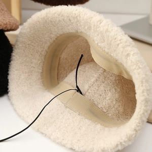 Adjustable plush knit bucket hat for women in off-white faux shearling with inner drawstring