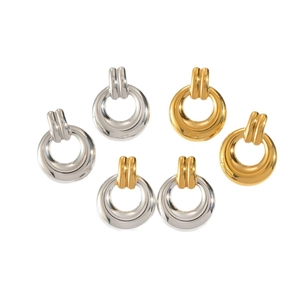 Three pairs of geometric hoop earrings in gold, silver, and dual-tone stainless steel