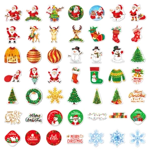 Selection of colorful waterproof holographic Christmas stickers featuring festive cartoon icons