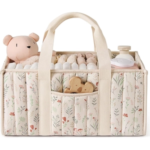 Close-up of quilted floral baby diaper caddy with spacious compartments for nursery storage