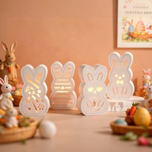 Detailed view of white hollow rabbit night lights with warm LED glow for Easter decor