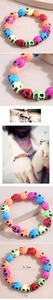 Detail view of colorful skull beads bracelet showing 5.5cm inner diameter and 1.2cm bead size