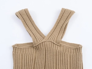 Close-up of ribbed knit texture and shoulder strap on a khaki knit tank top camisole