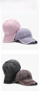 Vertical display of distressed washed cotton baseball caps with BONVRE 3D letter embroidery