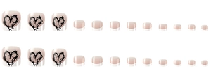 Detailed set of nude pink press-on toenails with black thorn heart pattern on flat white background