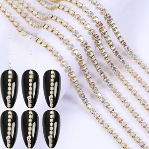 Detailed view of AB crystal rhinestone nail art chains on gold metal flexible base