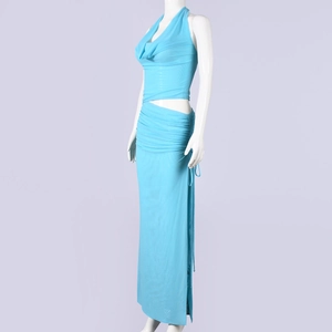 Detail of light blue mesh halter top and high-waist drawstring skirt with sheer fabric