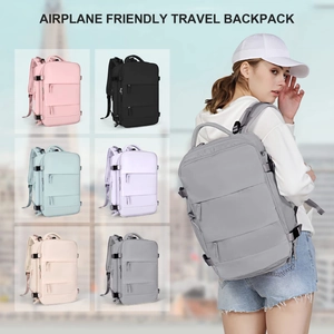 Airplane friendly travel backpacks shown in six colors with a grey model display