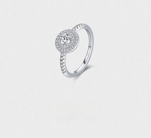 Macro shot of S925 hallmark on a sparkling silver halo ring with double pavé diamonds