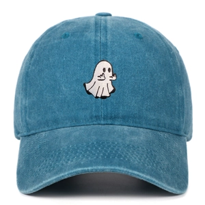 Close-up of white ghost embroidery on dark blue washed cotton vintage baseball cap
