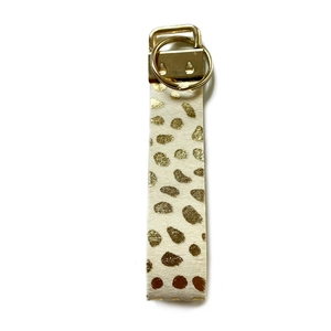 Fashionable gold spotted white cowhide leather keychain with premium gold metallic hardware