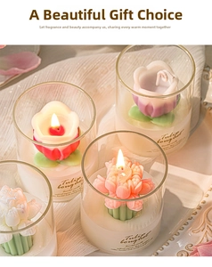 Detailed view of handmade flower scented candles in glass jars with elegant labels