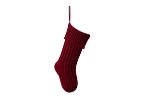 Detailed macro view showing the thick knit texture of the red Christmas stocking with a hanging loop