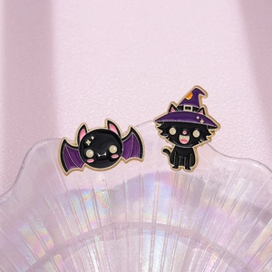 Cute Halloween enamel brooches featuring wizard cat and bat wings in golden alloy