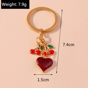 Detailed view of cherry heart keychain with dimensions 7.4cm and weight 7.9g