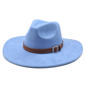Detail of light blue fedora hat with brown braided leather band and silver metal buckle