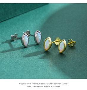 Macro shot of S925 sterling silver marquise opal stud earrings in gold and silver finish