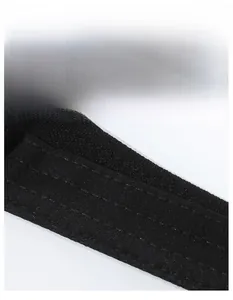 Macro shot of the widened black sweatband showing high-elasticity breathable knit fabric