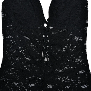 Macro shot of black lace fabric details with front lace-up design on a slim jumpsuit